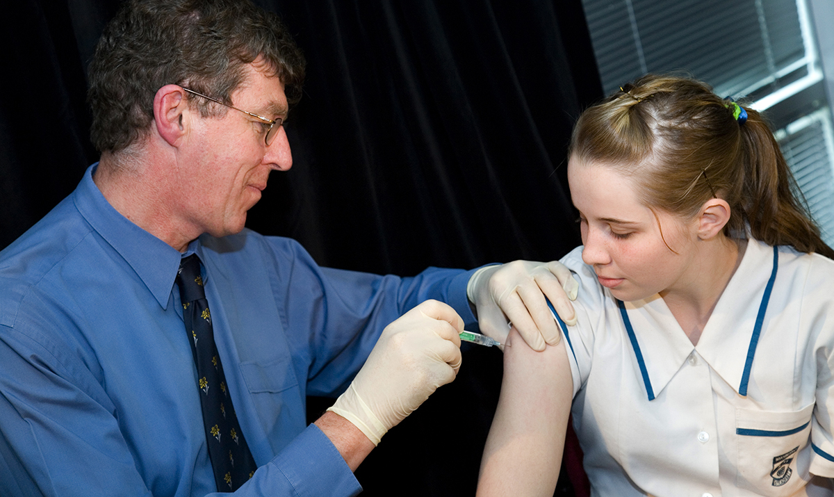 Teenage girl recieving HPV vaccine_1200