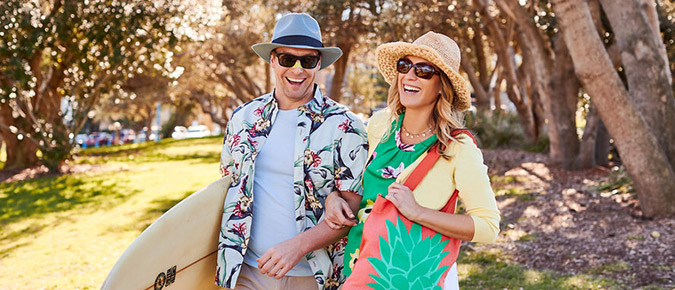 Couple wearing sunglasses and hat