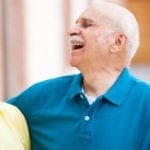 Elderly couple laughing