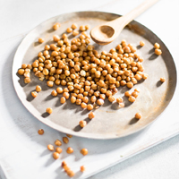 Roasted chickpeas scattered on a plate