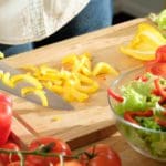 hands chopping vegetables