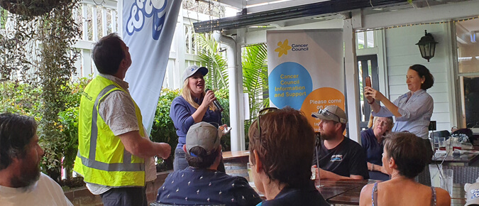 Woman speaking at a presentation. 