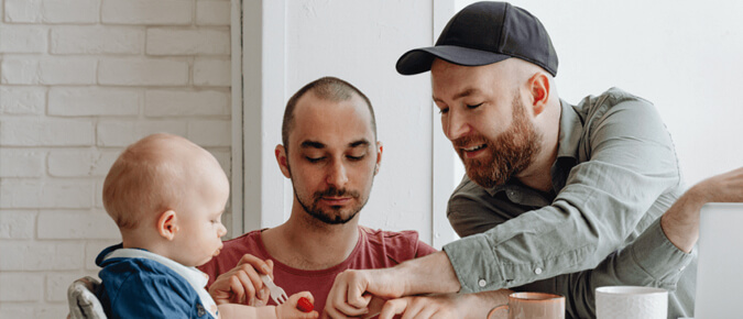 Gay couple with child.