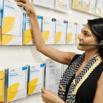 cancer council support staff picking out a pamphlet