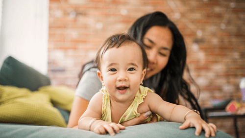 mum with her baby smiling