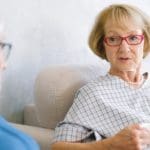 two elderly women chatting