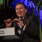 Vince Sorrenti speaking at podium at cancer council POSH gala