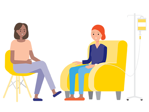 two people sit and chat. One has an IV bag attached.