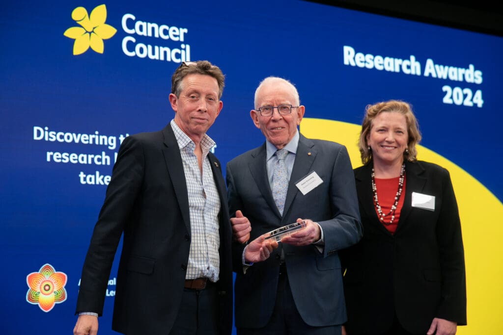 Professor Peter Croucher receiving the Sally Crossing AM Award at the Research Awards 2024.