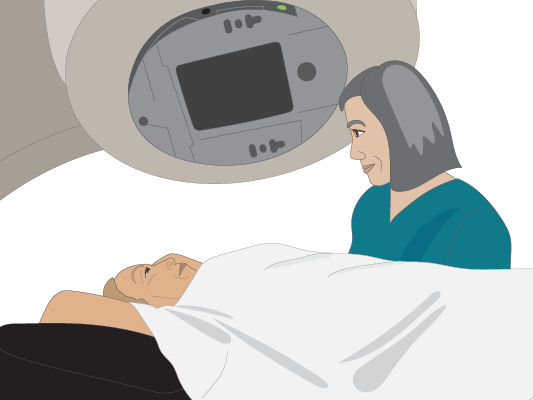 Image of patient and nurse and radiation therapy machine.